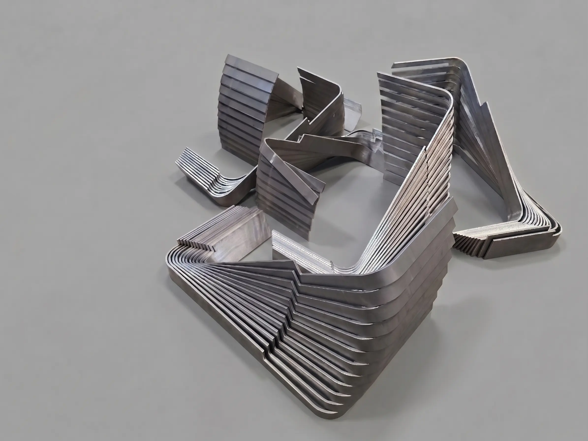 Bent angle brackets, organized in two distinct piles
