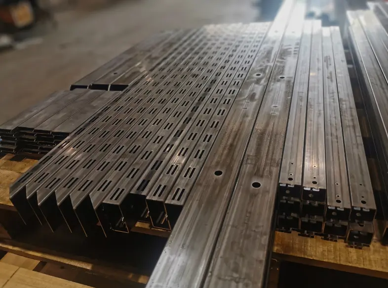 Top view of a compact bundle of square tubes with repeated laser slots