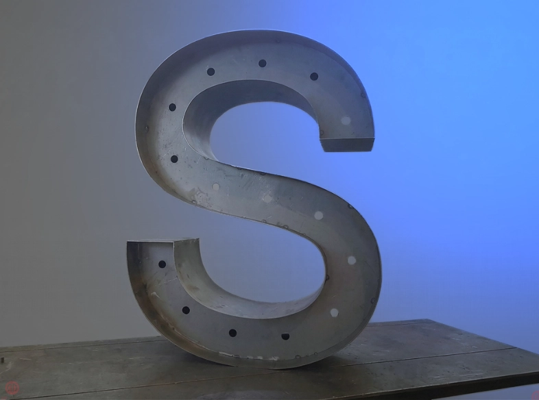 Raw iron structural component cut by laser and welded
