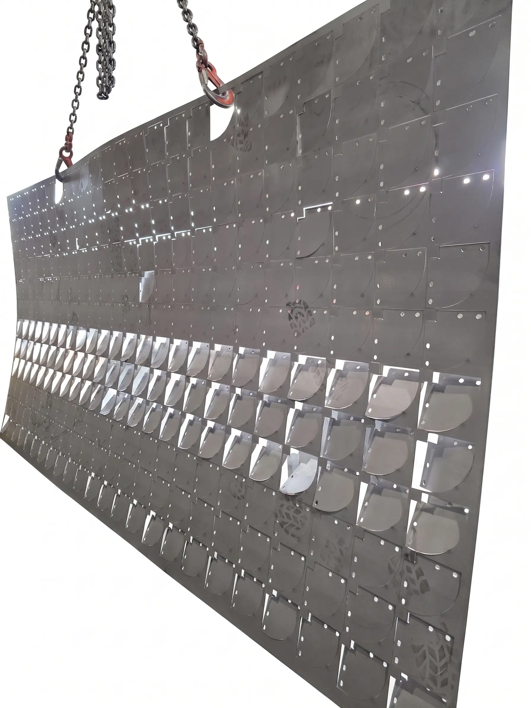 Flat metal plate intersected by a dense grid of circular holes