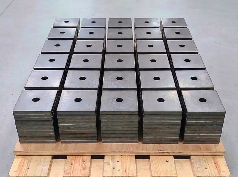 Extra-thick square plates with a central hole, arranged in a grid