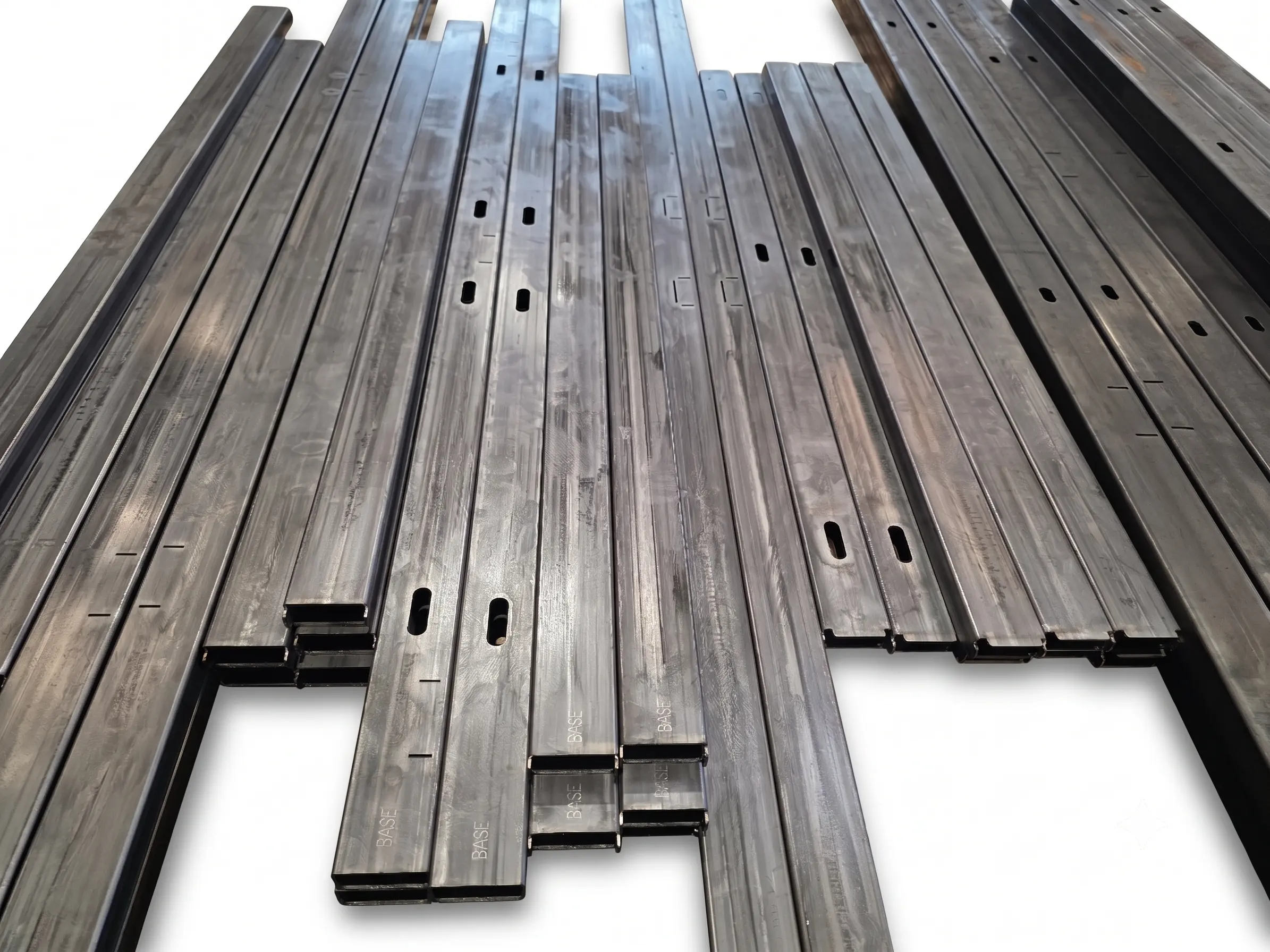 Rectangular and square section tubular profiles with precision holes and slots